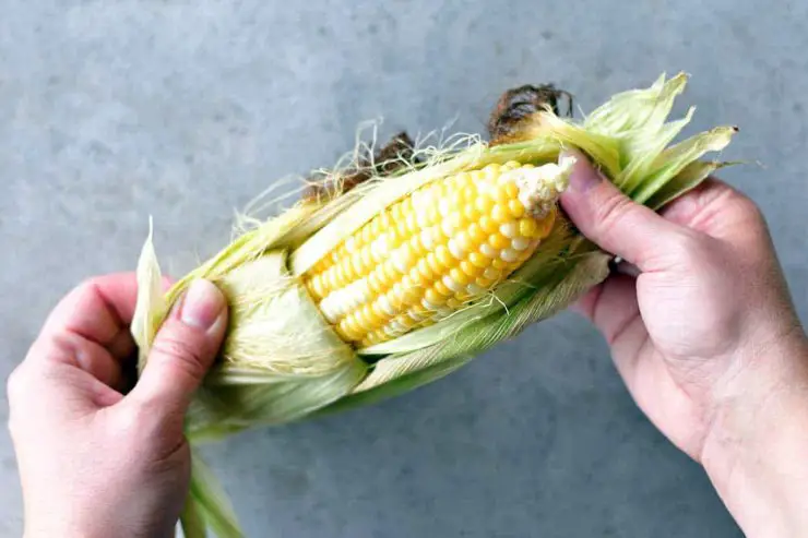removing husk from corn